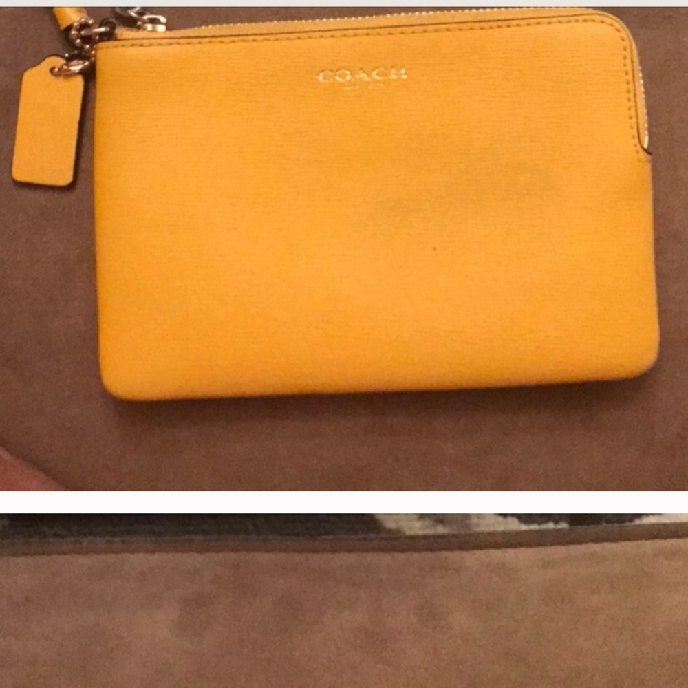 Yellow Coach wristlet on hold until Sunday!
